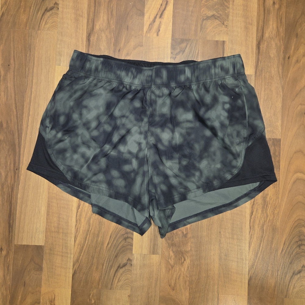 Green and black athletic shorts, size 12-14